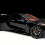 Black Corvette C8 Z06 with Red Interior in Luxe AF Motors Warehouse
