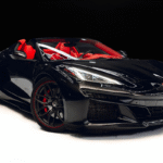 Black Corvette C8 Z06 with Red Interior in Luxe AF Motors Warehouse