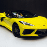 Yellow Chevrolet Corvette Convertible Stingray C8 in Luxe AF Motors Warehouse in Houston, Texas