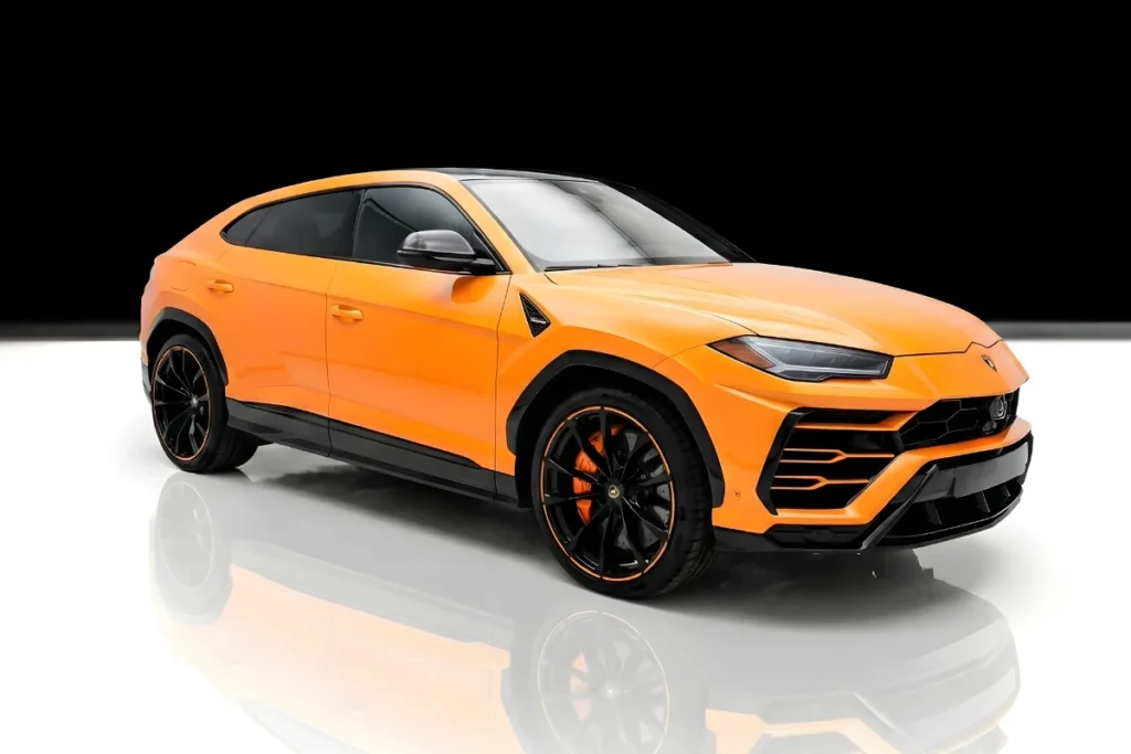 Orange Lamborghini Urus Pearl Capsule rental Houston front side view