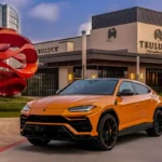 Orange Lamborghini Urus Pearl Capsule rental parked at Truluck's Ocean's Finest Seafood and Crab in The Woodlands, TX
